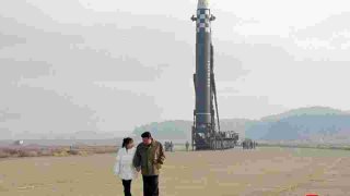Kim Jong's first image with his daughter was with a ballistic missile!