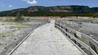 Surprise blast of rock, water and steam sends dozens running for safety in Yellowstone 